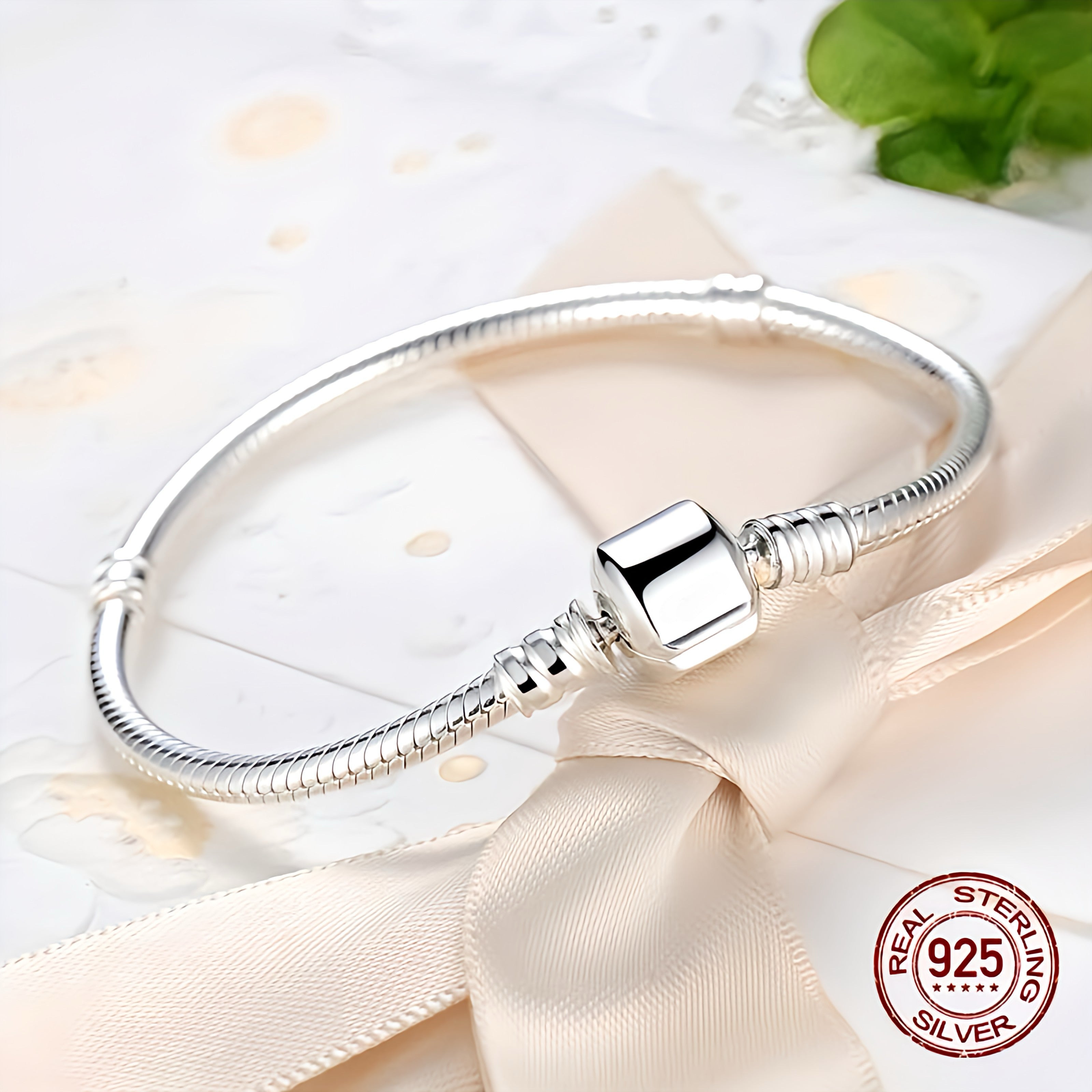 Description:
Celebrate life's precious moments with our exquisite 925 sterling silver charm bracelet. Its smooth, snake bone design whispers sophistication, perfect for making unforgettable memories.
• 100% brand new, certified fine jewelry
• Hypoallergenic, nickel-free silver for sensitive skin
• Timeless design suits any occasion, from weddings to everyday wear
• Luxurious packaging in OPP bag and/or jewelry box