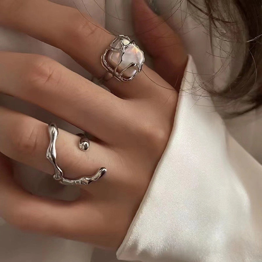 Sleek Hollow Zircon Ring